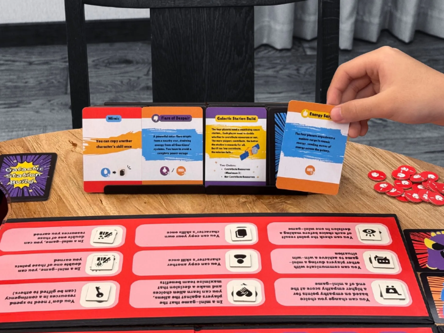 Product trial photo: a player draws an Energy Surge event card from the card rack